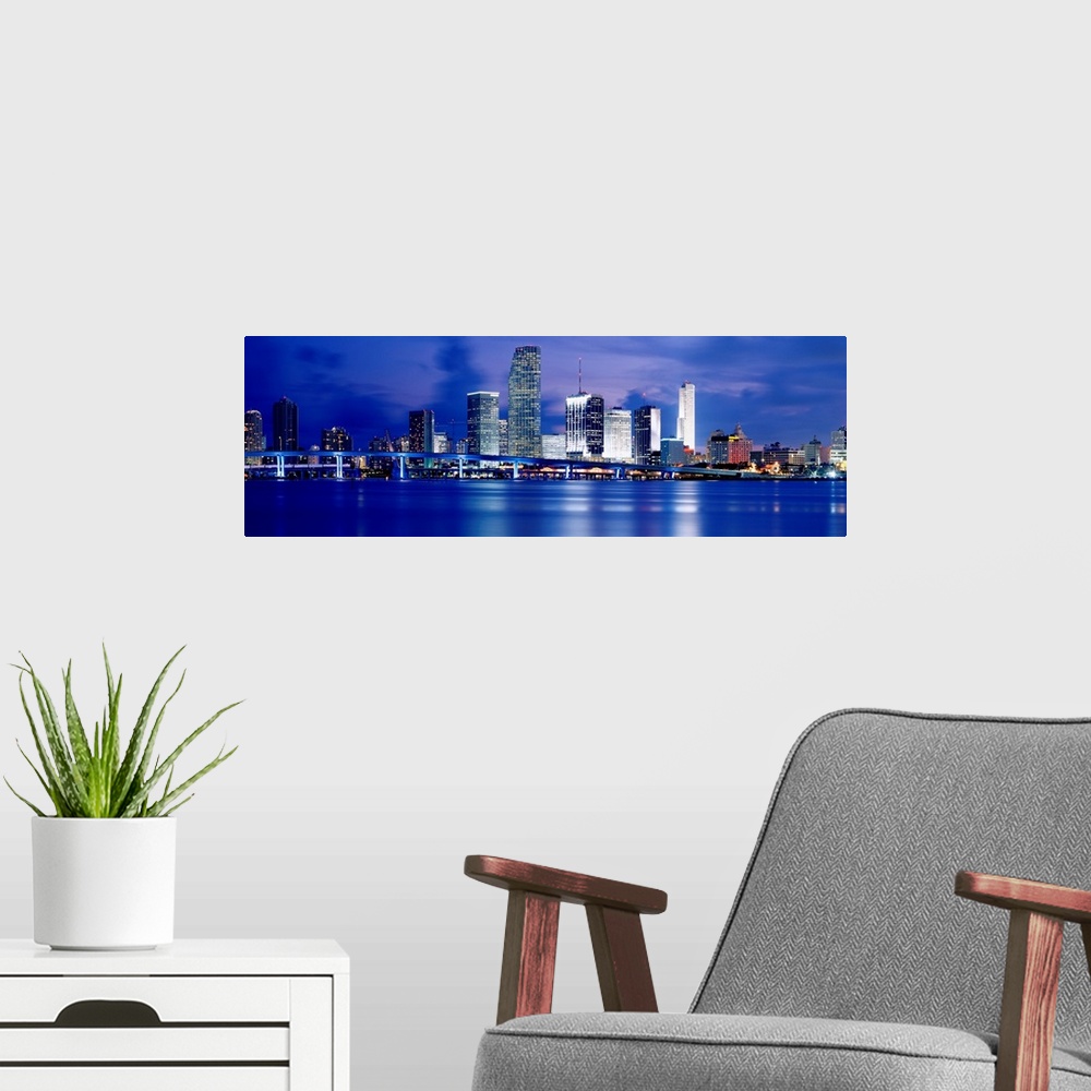 A modern room featuring Miami, Florida waterfront with downtown skyline.