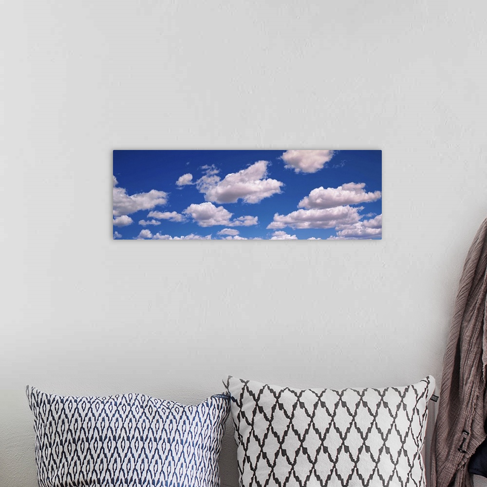 A bohemian room featuring Fluffy Clouds in Fair Weather Sky