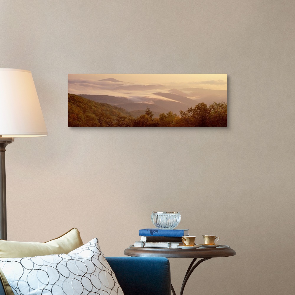 A traditional room featuring View from the Blue Ridge Parkway of a foggy sunrise over a mountain range in North Carolina.