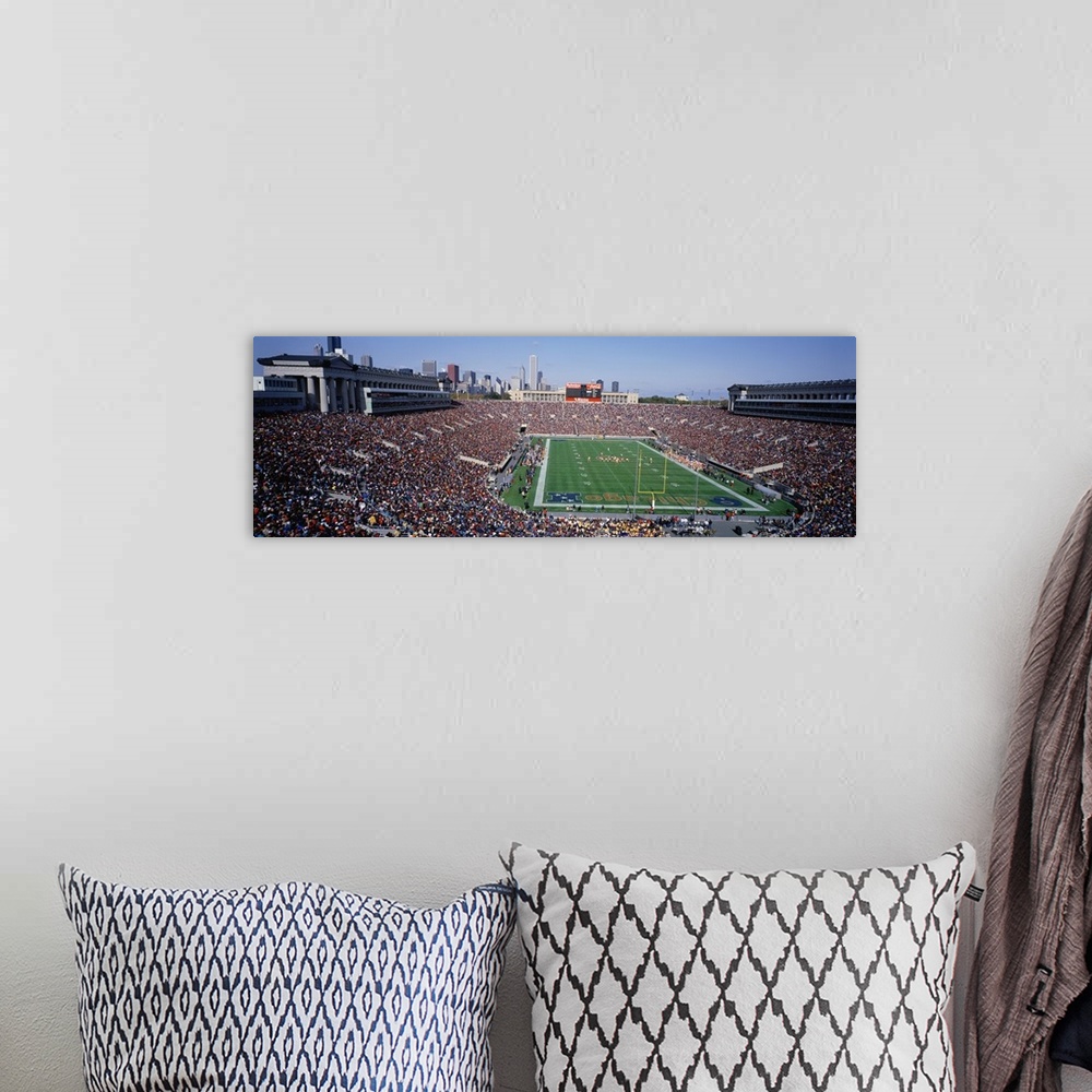 A bohemian room featuring Panoramic photograph of NFL stadium with the city's skyline in  the distance under clear skies.  ...