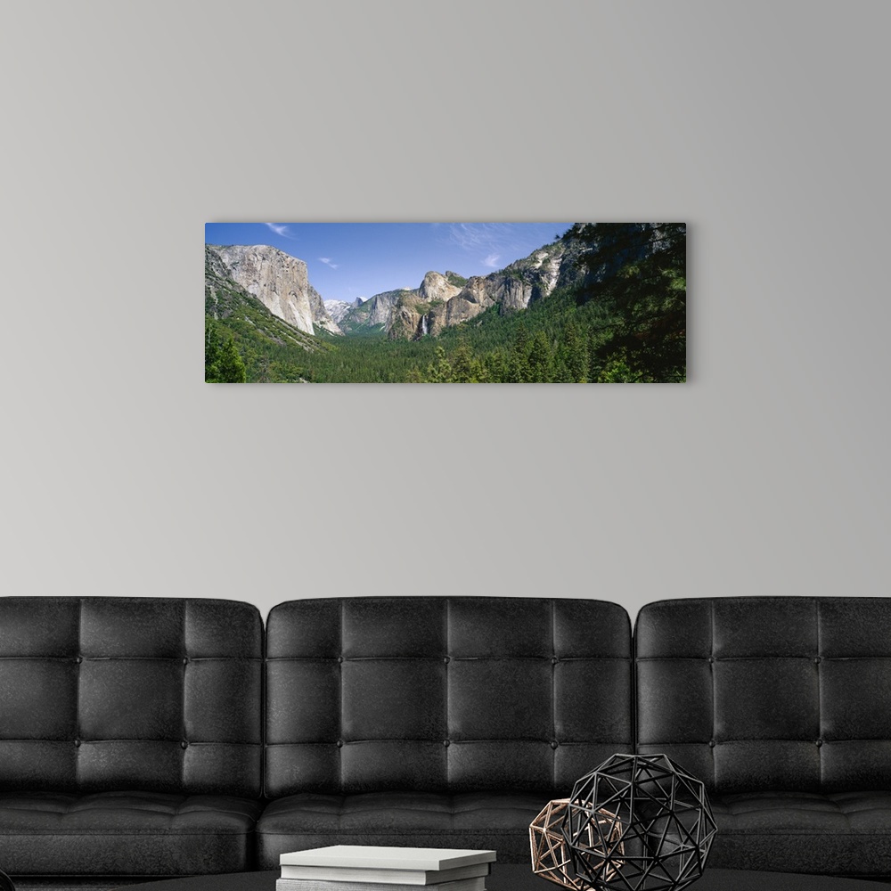 A modern room featuring Forest in front of mountains, El Capitan, Bridal Veil Falls, Half Dome, Yosemite National Park, C...