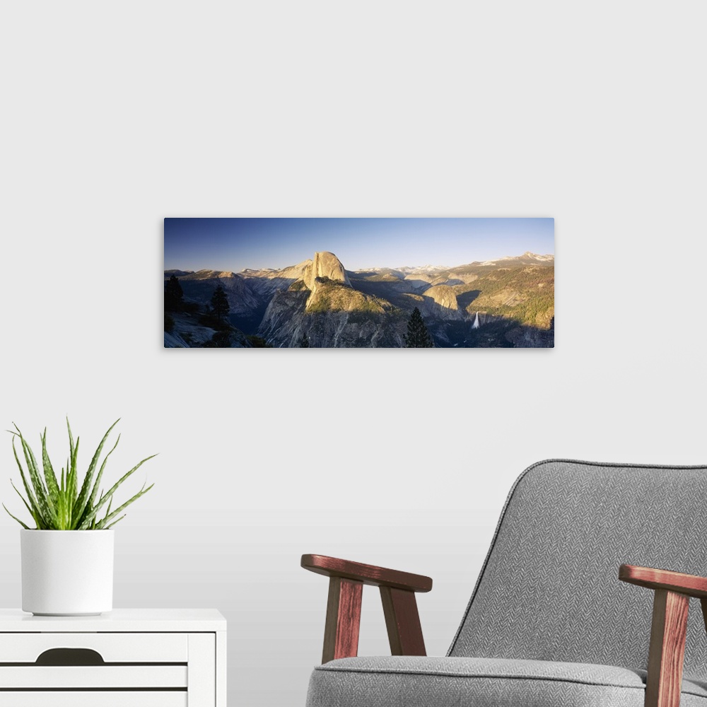 A modern room featuring Forest on mountains with a waterfall in the background, Glacier Point, Yosemite National Park, Ca...