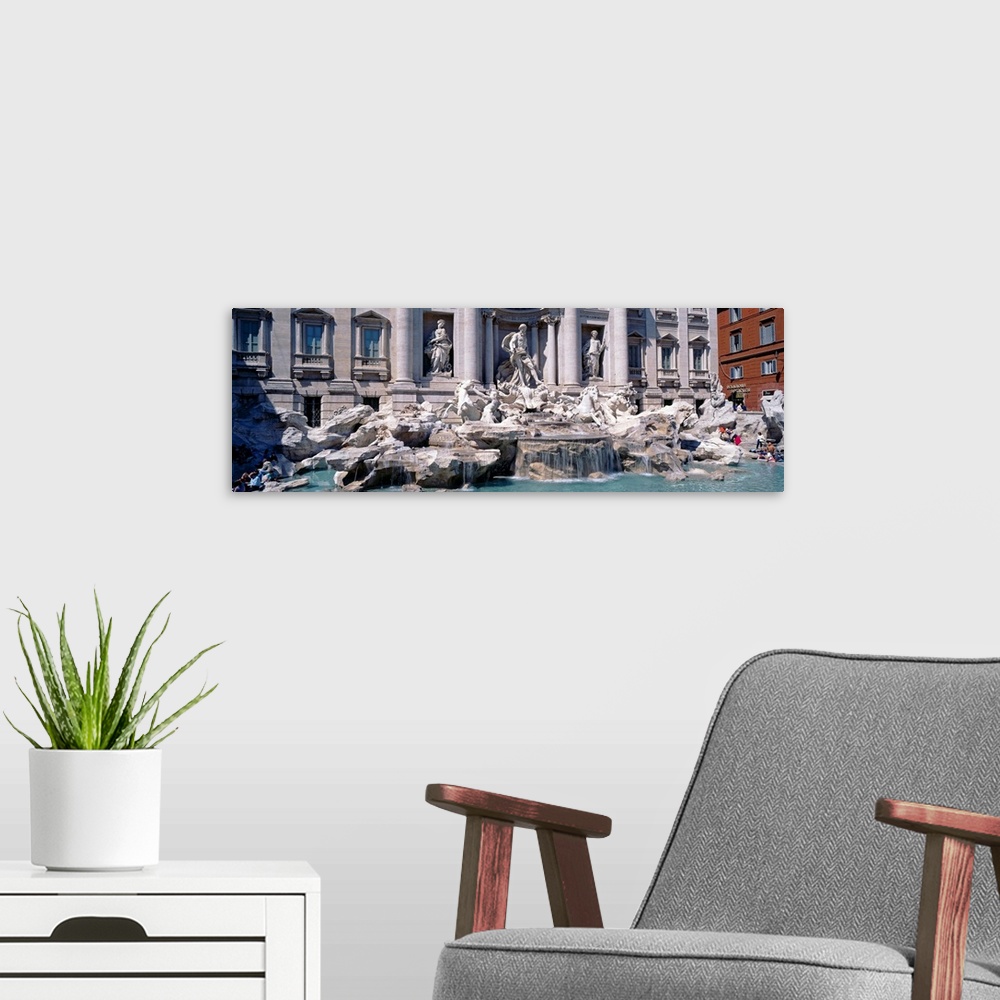 A modern room featuring Fountain in front of a building, Trevi Fountain, Rome, Italy