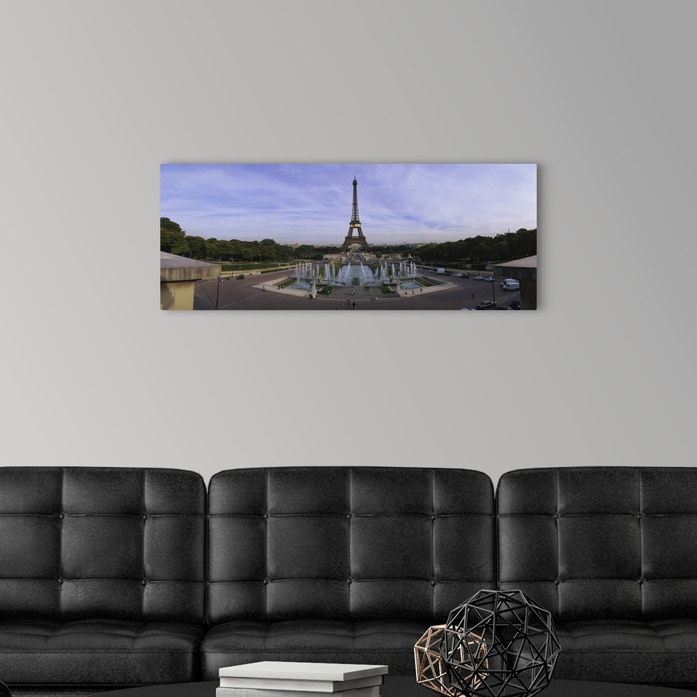 A modern room featuring Fountain in front of a tower, Eiffel Tower, Paris, France