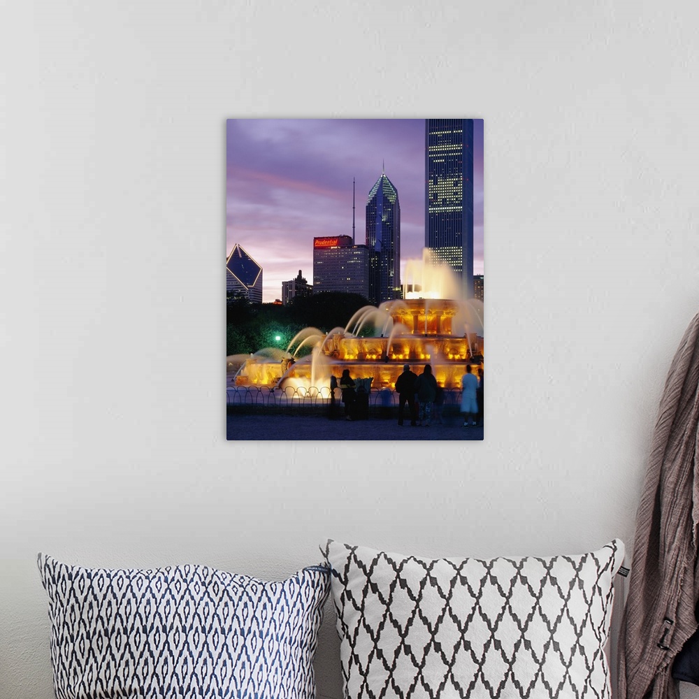 A bohemian room featuring Vertical photograph on a large wall hanging of Buckingham Fountain, lit at night, in Grant Park, ...