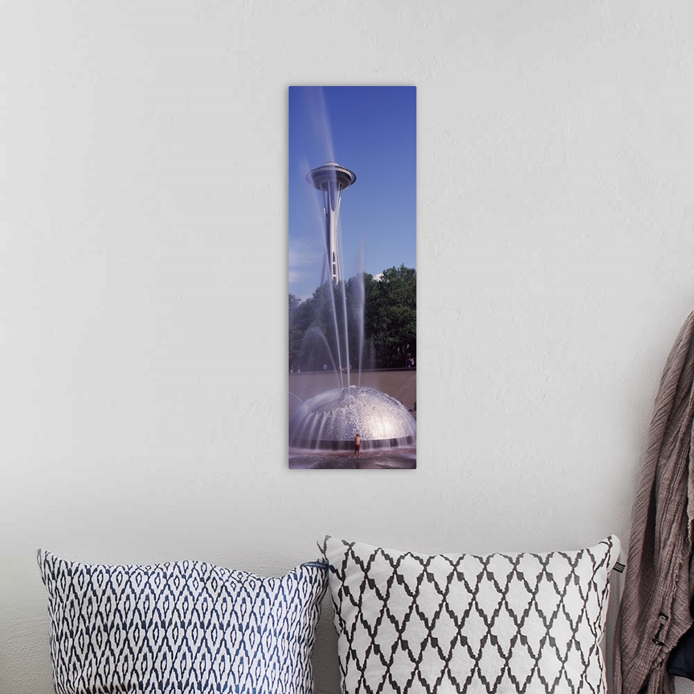 A bohemian room featuring Fountain with a tower in the background Space Needle Seattle King County Washington State
