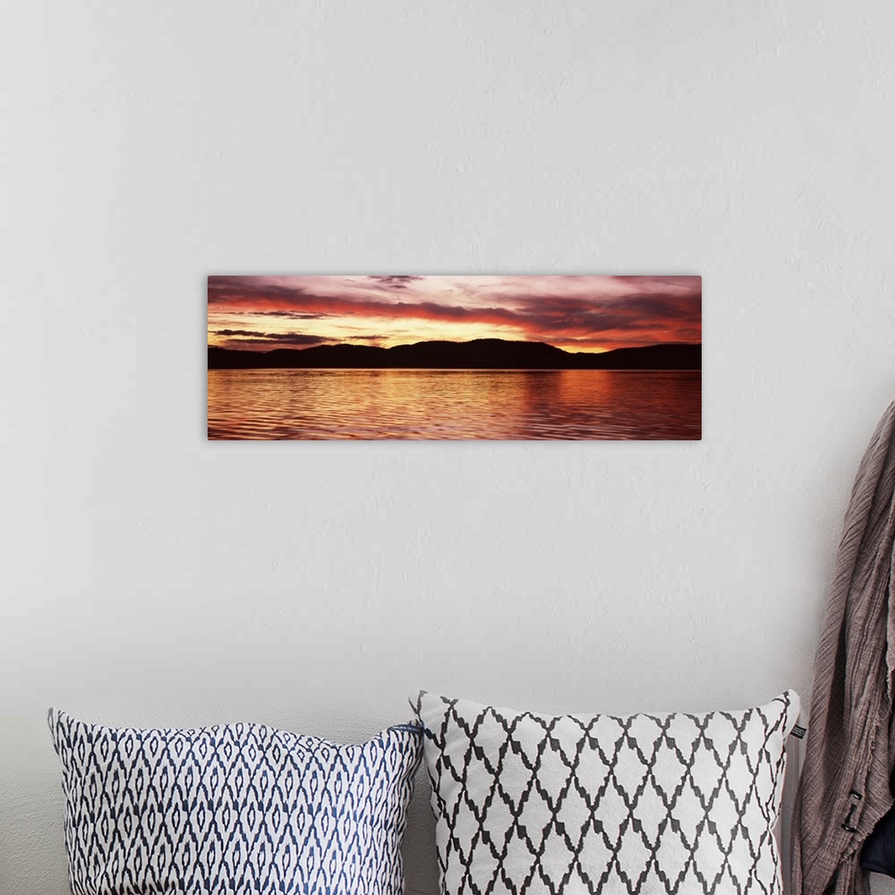 A bohemian room featuring Sunset over Fourth Lake from Inlet in the Adirondack Mountains, New York