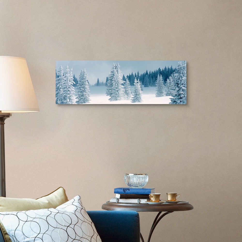 A traditional room featuring Panoramic photograph displays a Winter landscape of trees that have been covered in a blanket of ...