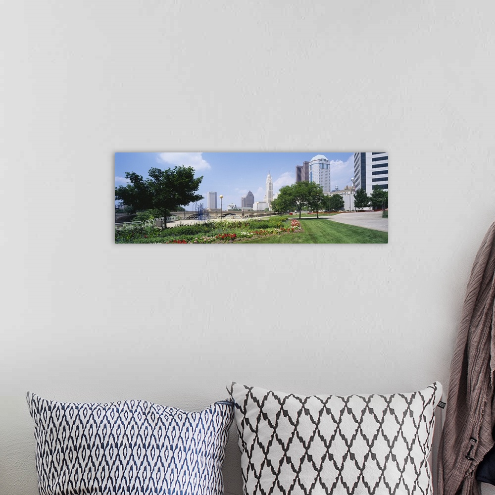 A bohemian room featuring Garden in front of skyscrapers in a city, Scioto River, Columbus, Ohio