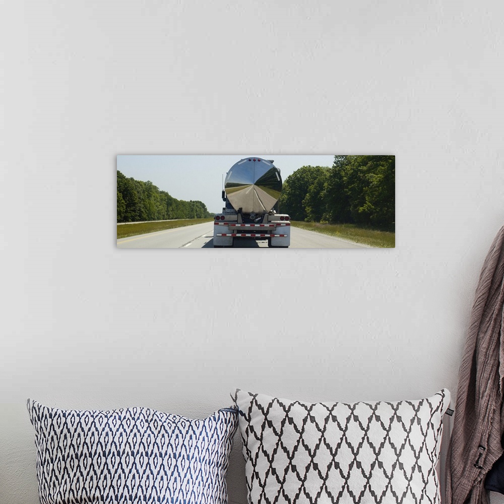 A bohemian room featuring Gas delivery truck moving on a highway