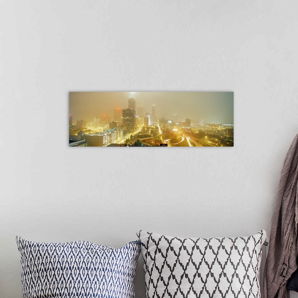 A bohemian room featuring A time-lapsed photograph of the roads through the city and skyscrapers in the fog on a panoramic ...