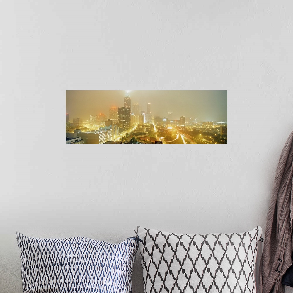 A bohemian room featuring A time-lapsed photograph of the roads through the city and skyscrapers in the fog on a panoramic ...