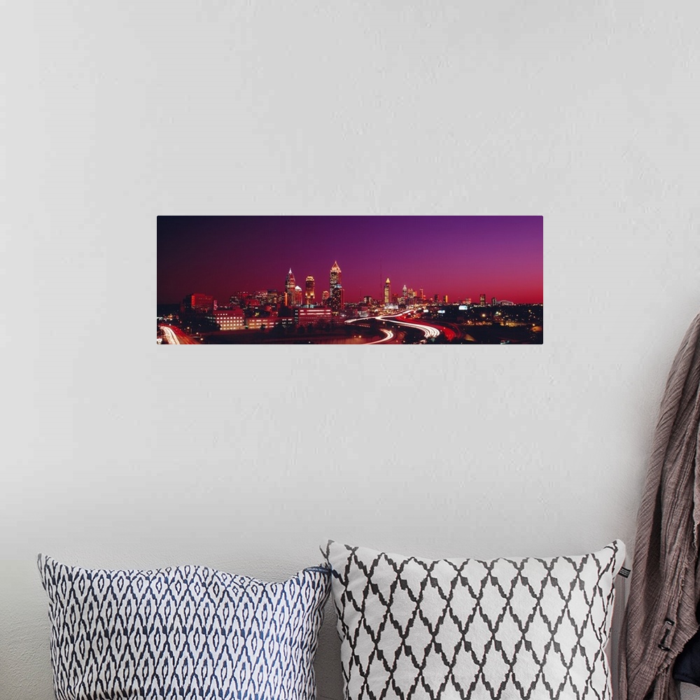 A bohemian room featuring Panoramic photograph displays the busy streets of a famous city in the Southeastern United States...