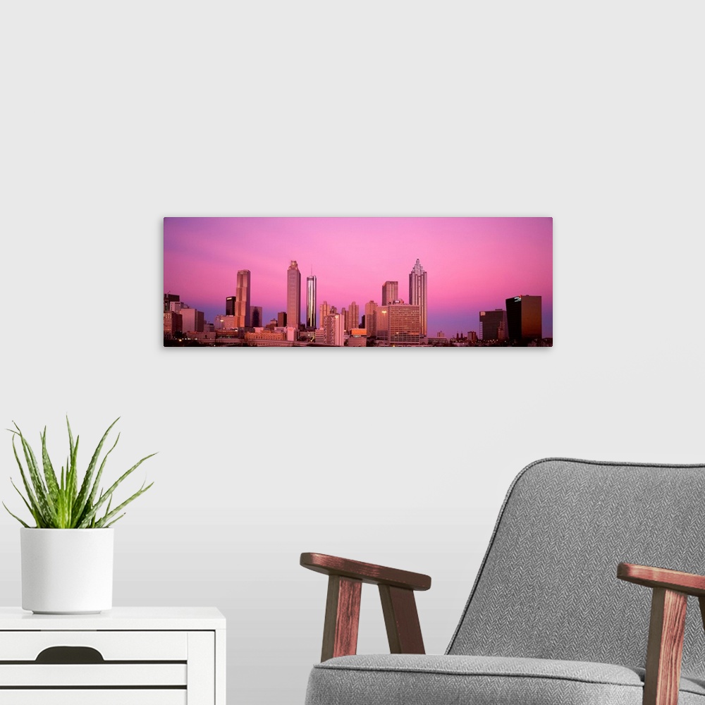A modern room featuring Georgia, Atlanta, Panoramic view of the city at dawn