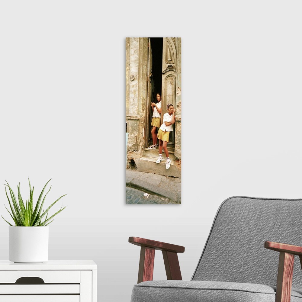 A modern room featuring Girls in Doorway Cuba