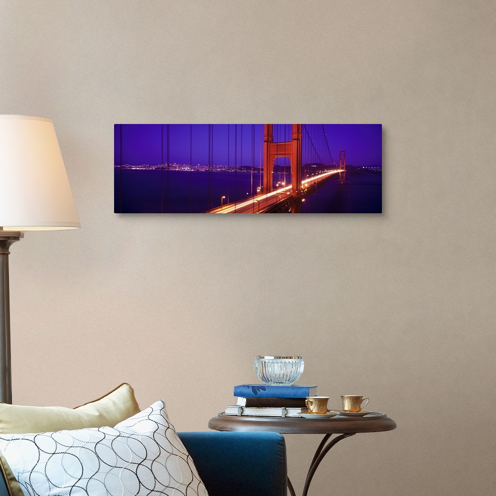 A traditional room featuring Twilight and red hue of the Golden Gate Bridge in San Francisco, California.