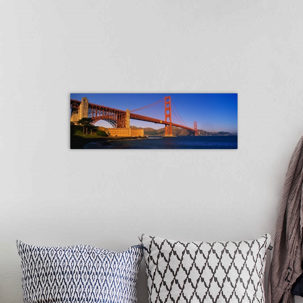 A bohemian room featuring Panorama of the Golden Gate Bridge over the San Francisco Bay in California.