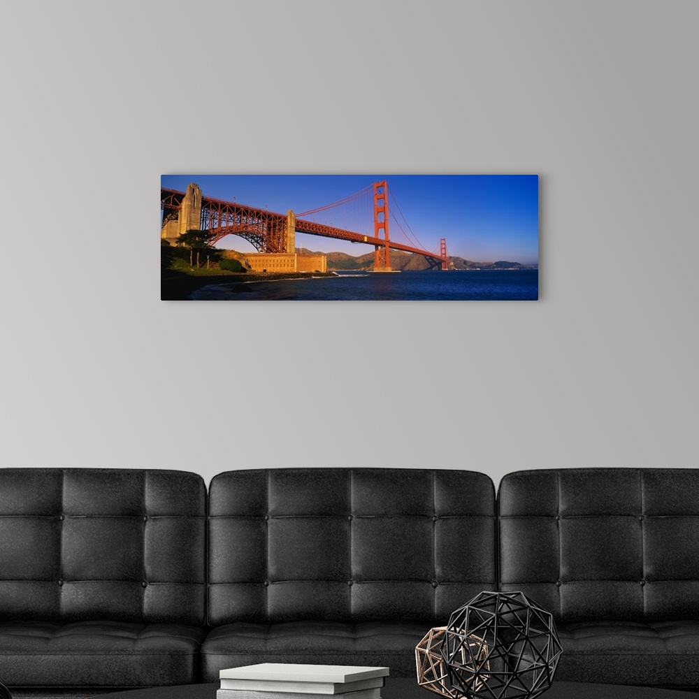 A modern room featuring Panorama of the Golden Gate Bridge over the San Francisco Bay in California.