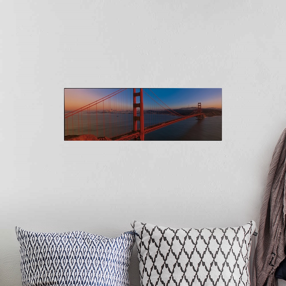 A bohemian room featuring Panoramic photograph of the iconic suspension bridge in California's Bay Area during sunset, with...
