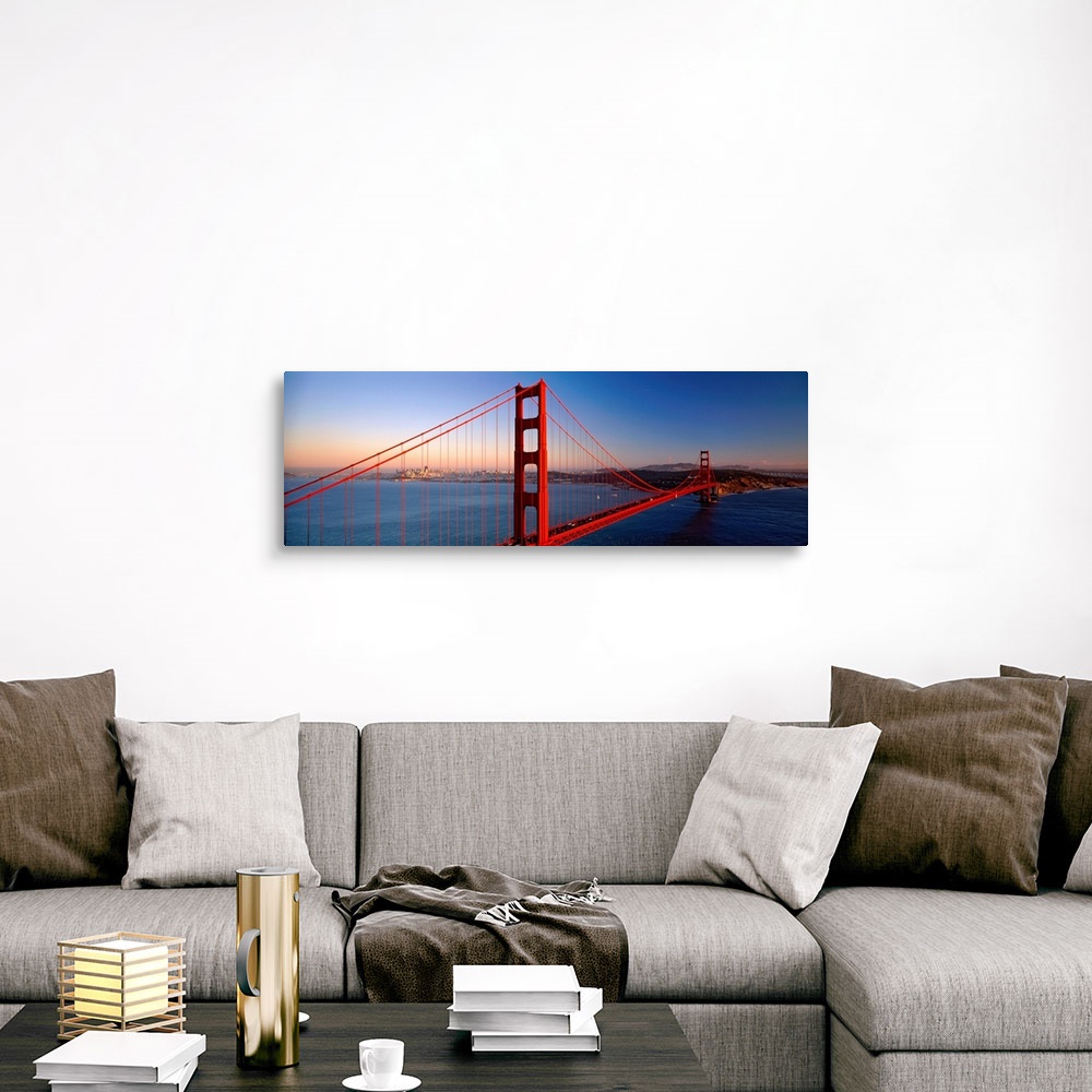 A traditional room featuring Big landscape photograph of the Golden Gate Bridge extending over the blue waters of the San Fran...