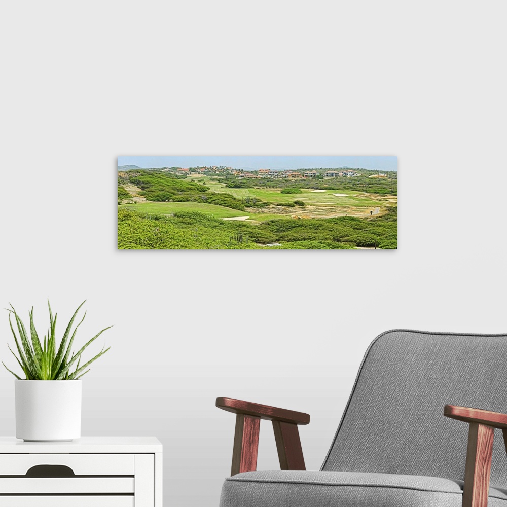 A modern room featuring Golf course on the northern end of the island, Aruba