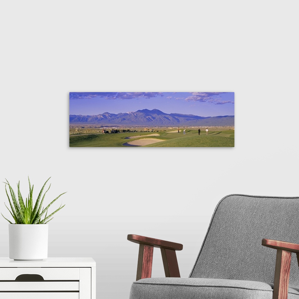 A modern room featuring Golf Course Taos NM