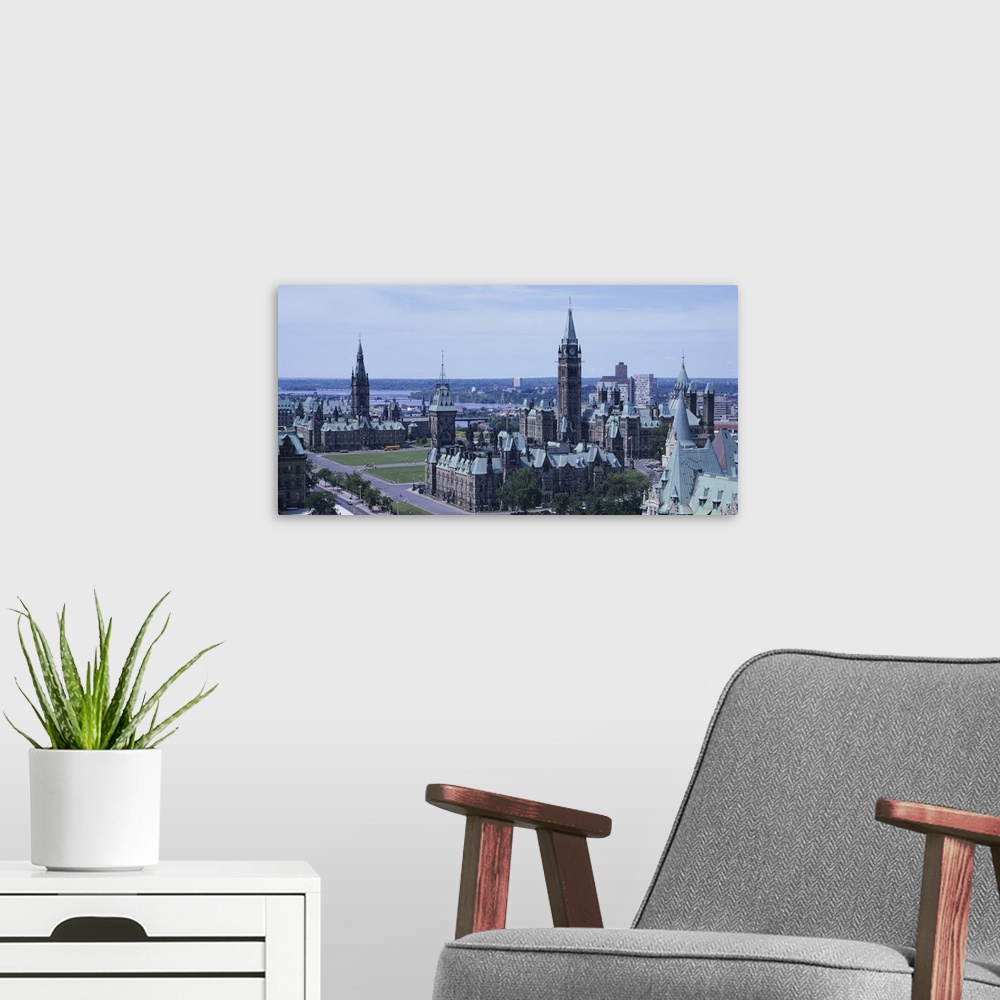 A modern room featuring Government building and hotel in a city, Parliament Hill, Chateau Laurier, Ottawa River, Ottawa, ...