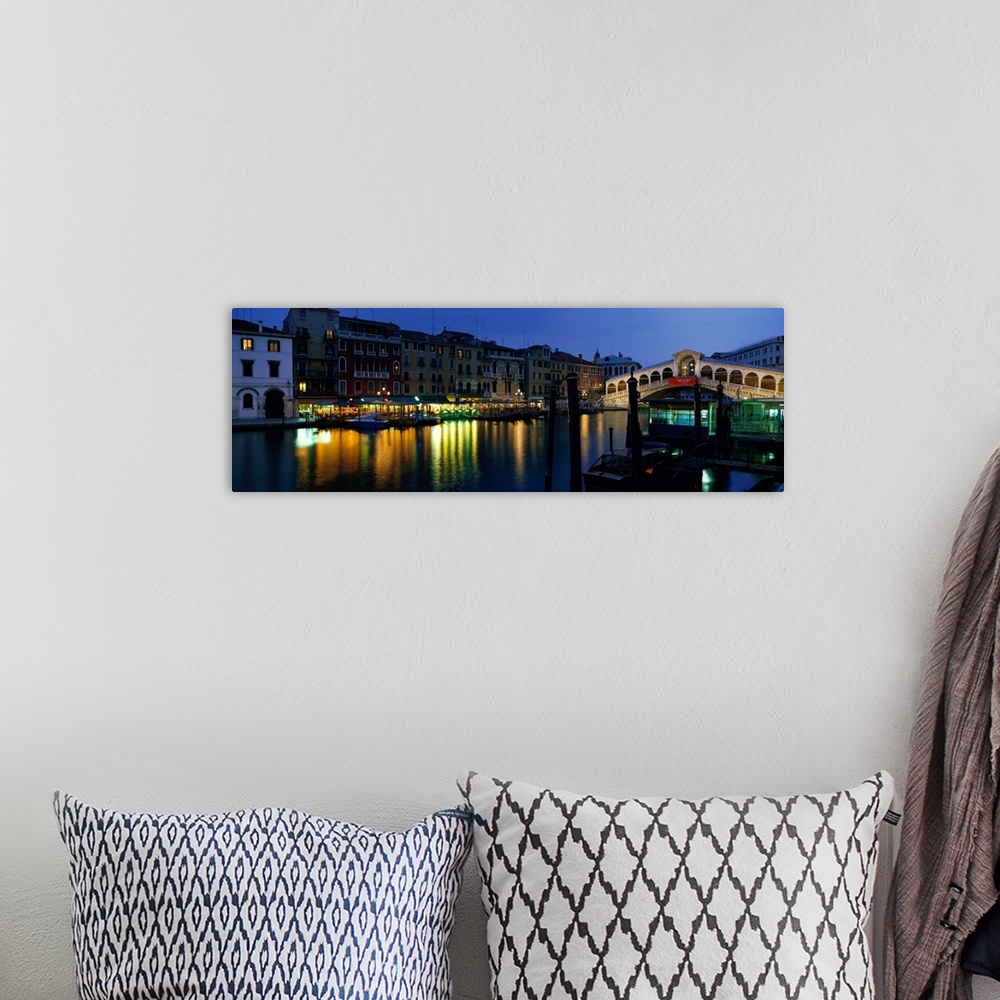 A bohemian room featuring Panoramic photograph displays the oldest overpass of a famous waterway in Europe as it spans two ...