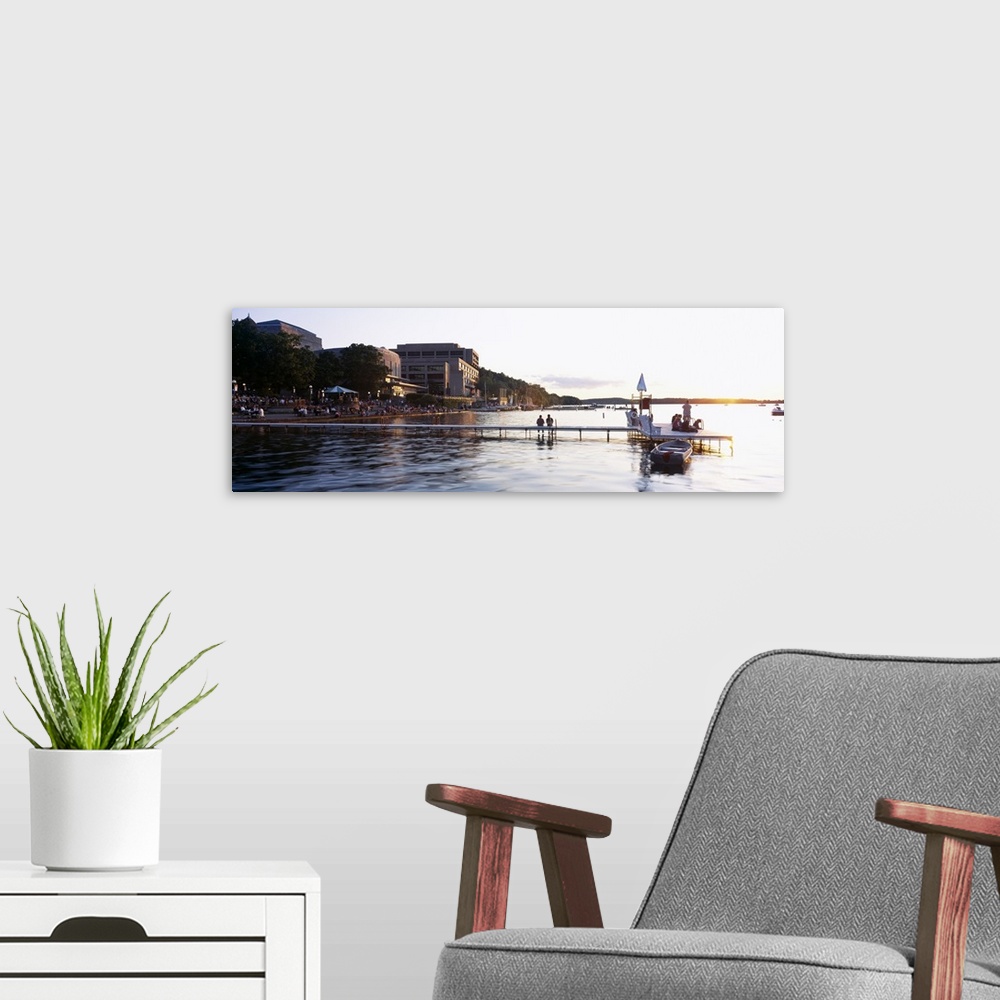 A modern room featuring Group of people at a waterfront, Lake Mendota, University of Wisconsin, Memorial Union, Madison, ...