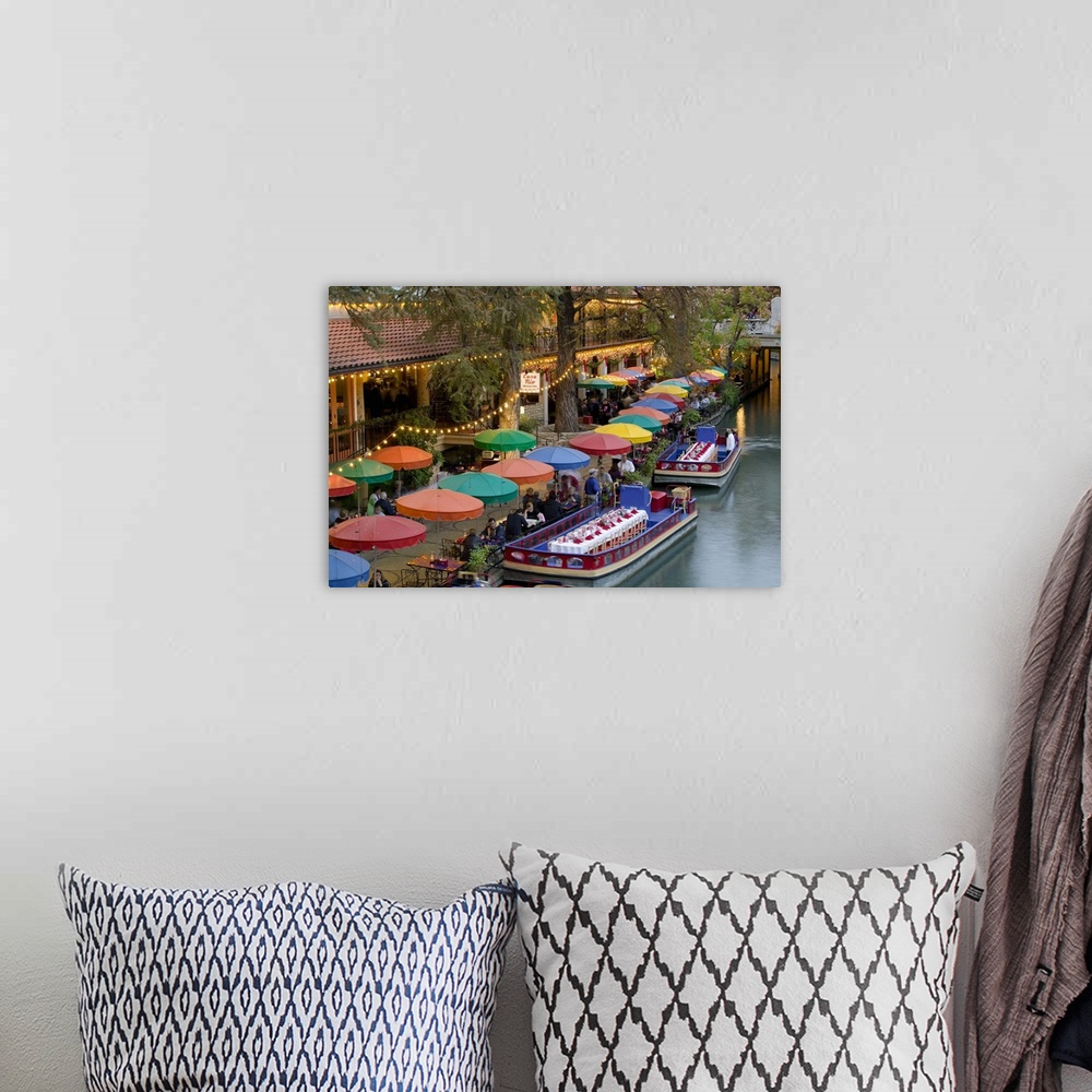 A bohemian room featuring Large photo on canvas of colored umbrellas along a waterfront with boats with tables and chairs d...