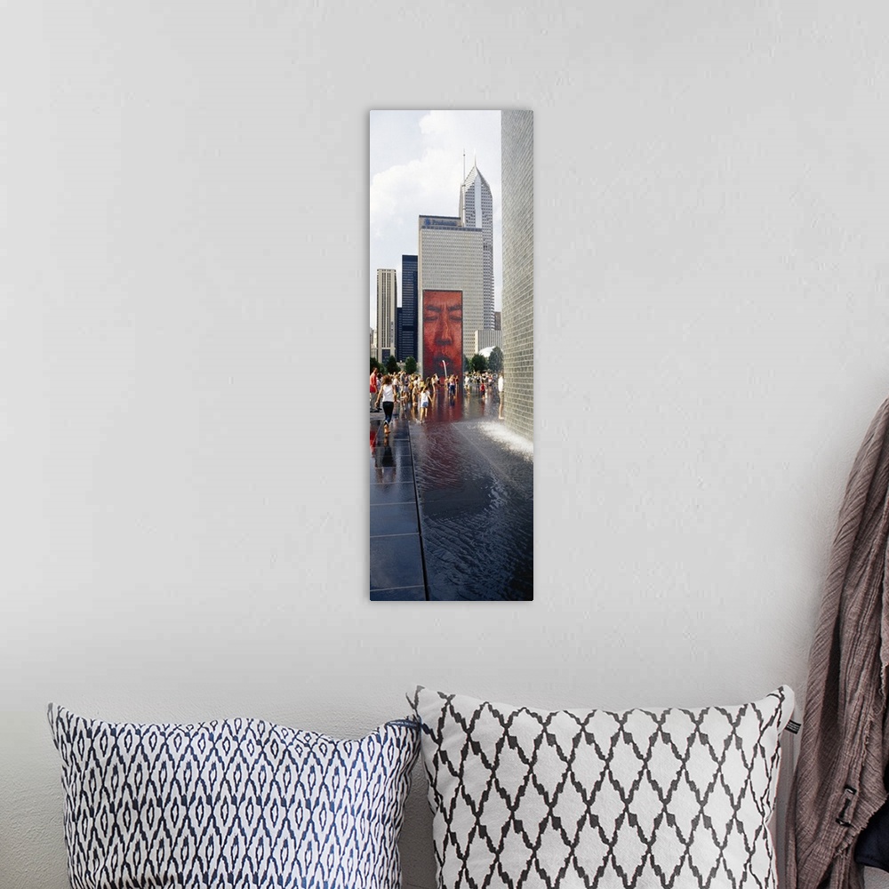 A bohemian room featuring Oversized vertical photograph of a large group of people surrounding Crown Fountain in Chicago's ...