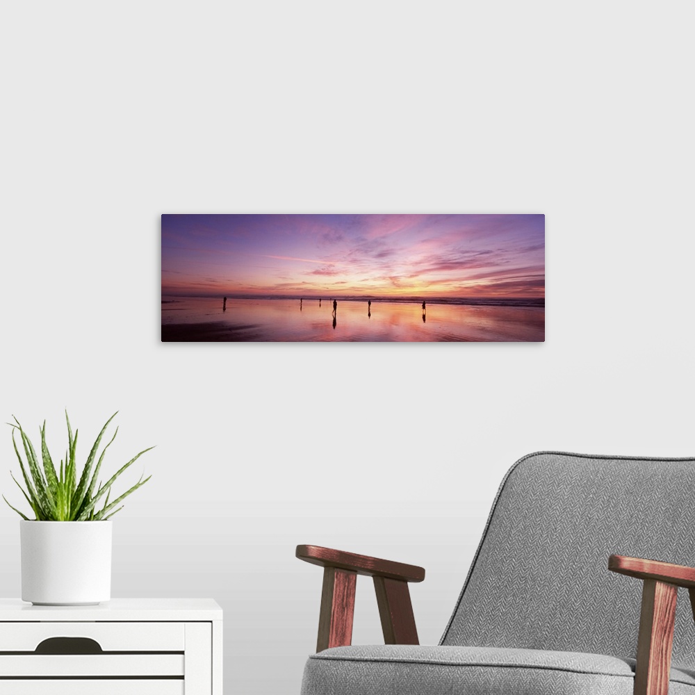 A modern room featuring Group of people watching the sunset, San Francisco, California