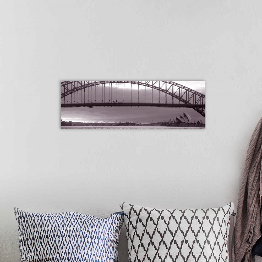 A bohemian room featuring Panoramic photo on canvas of a long bridge over water in Sydney with the Opera House in the lower...