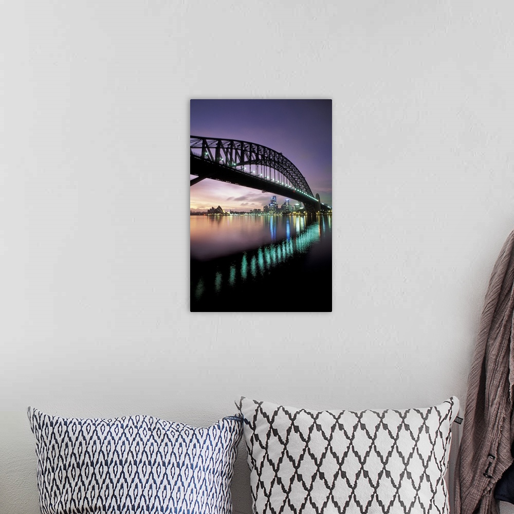 A bohemian room featuring Steel arch bridge crossing over the harbor in the evening, with the Sydney Opera house in the dis...