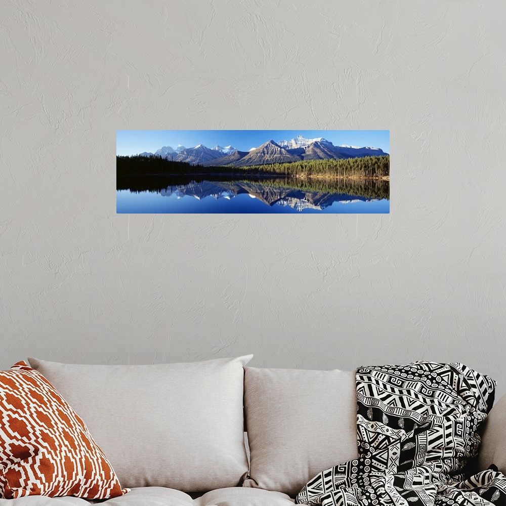 A bohemian room featuring Herbert Lake Banff National Park Alberta Canada