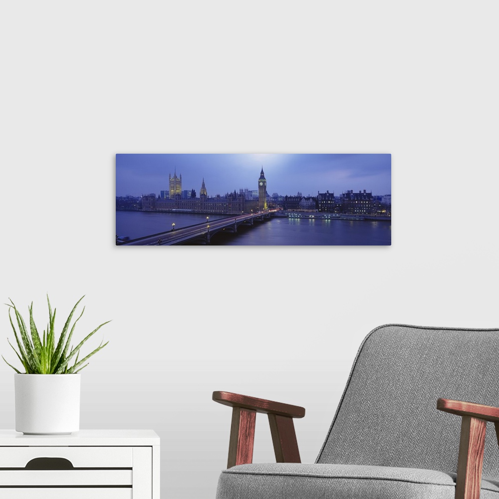 A modern room featuring London Skyline. High angle view of a bridge across the Thames, Westminster Bridge, Big Ben, House...