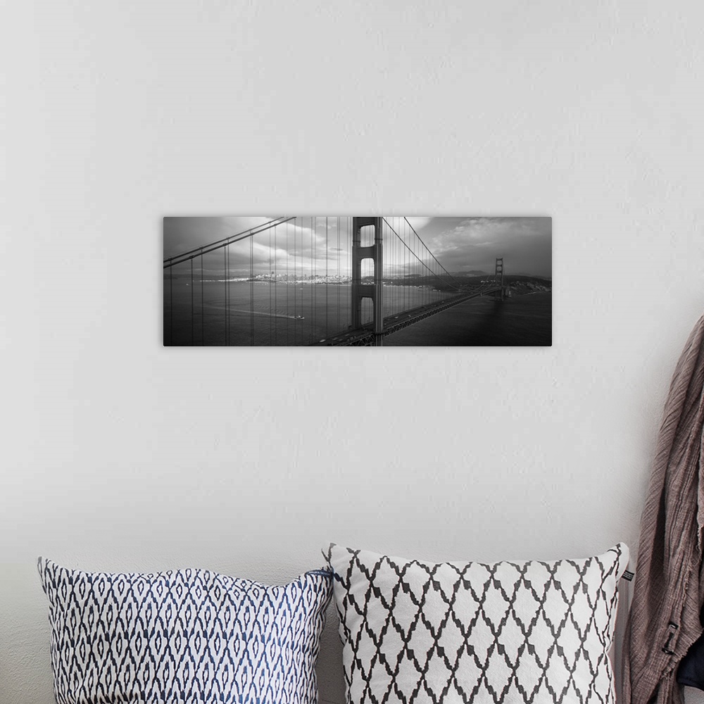 A bohemian room featuring Panoramic photo on canvas of the Golden Gate Bridge with the San Francisco cityscape in the dista...