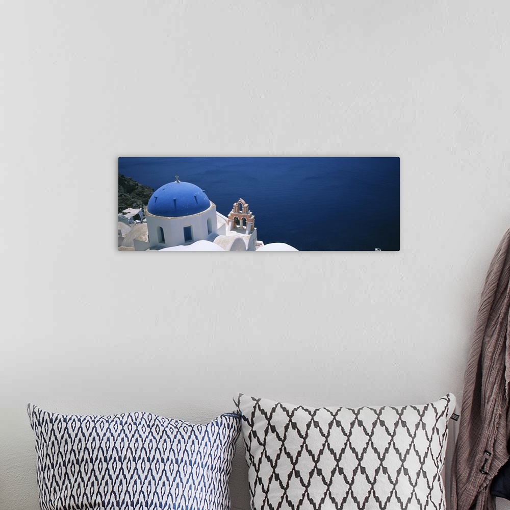 A bohemian room featuring High angle view of a church, Oia, Santorini, Greece