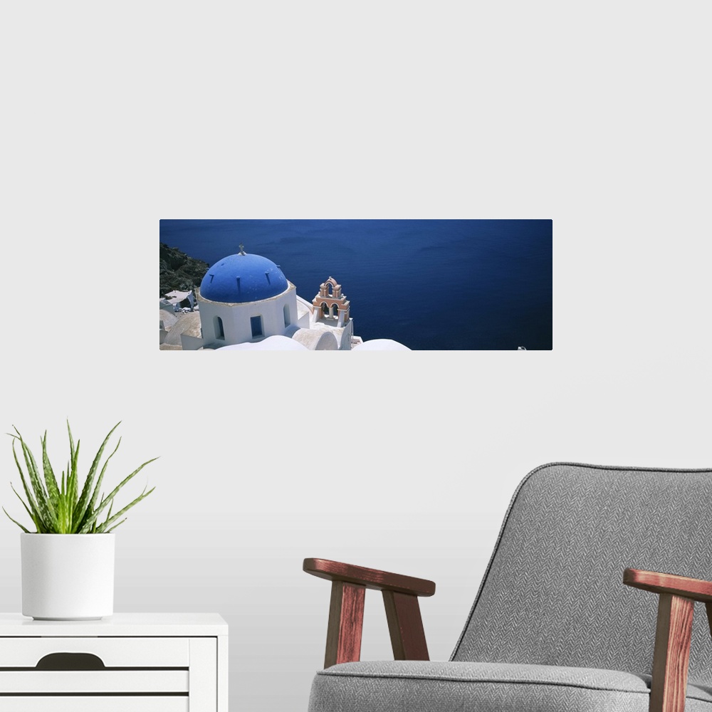 A modern room featuring High angle view of a church, Oia, Santorini, Greece