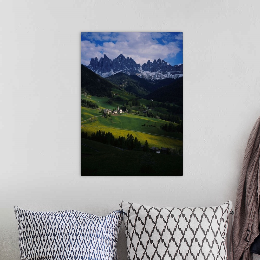 A bohemian room featuring High angle view of a church on a landscape, Dolomites, Funes Valley, Le Odle, Santa Maddalena, Ty...