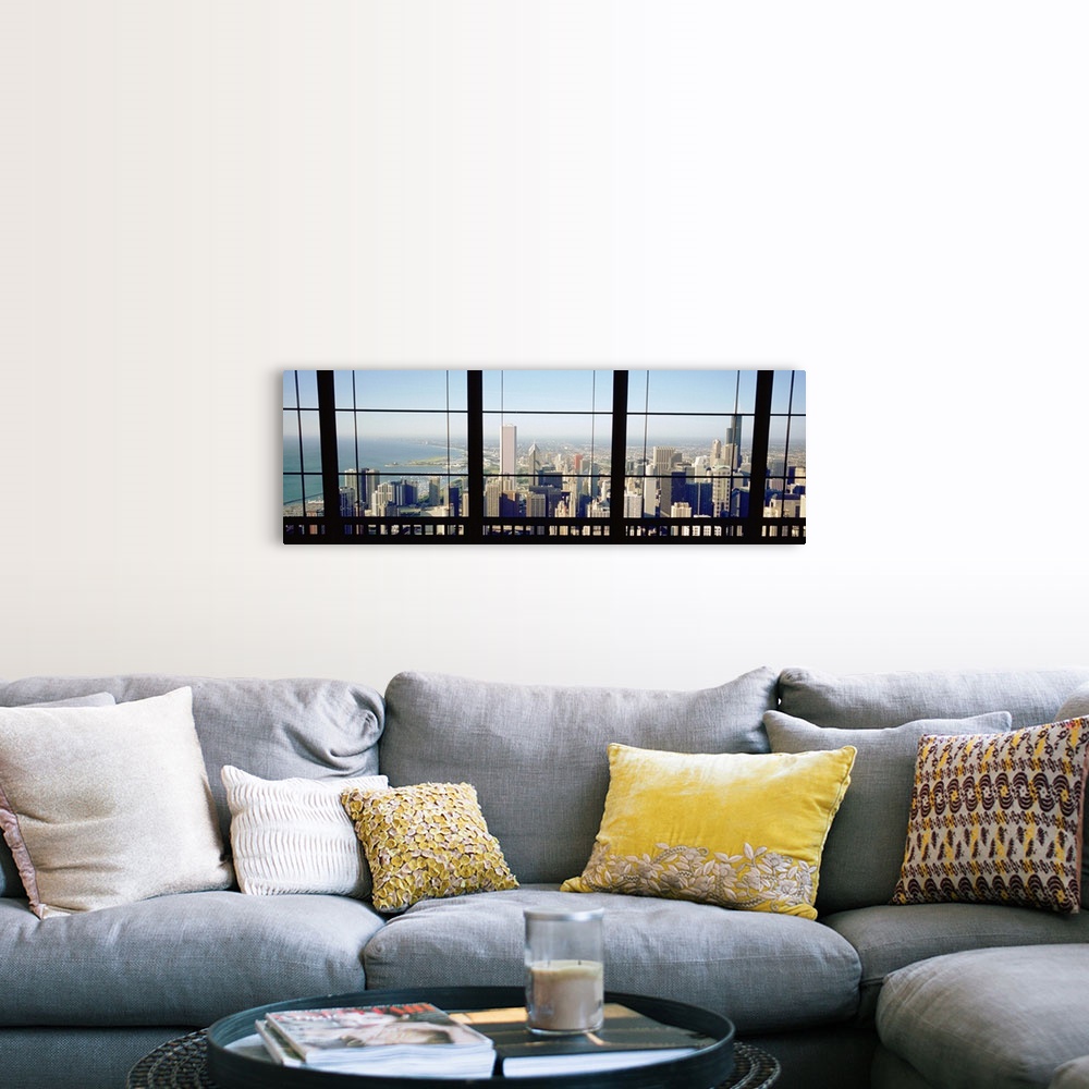 A farmhouse room featuring Panoramic photograph of skyline and waterfront from behind a window.