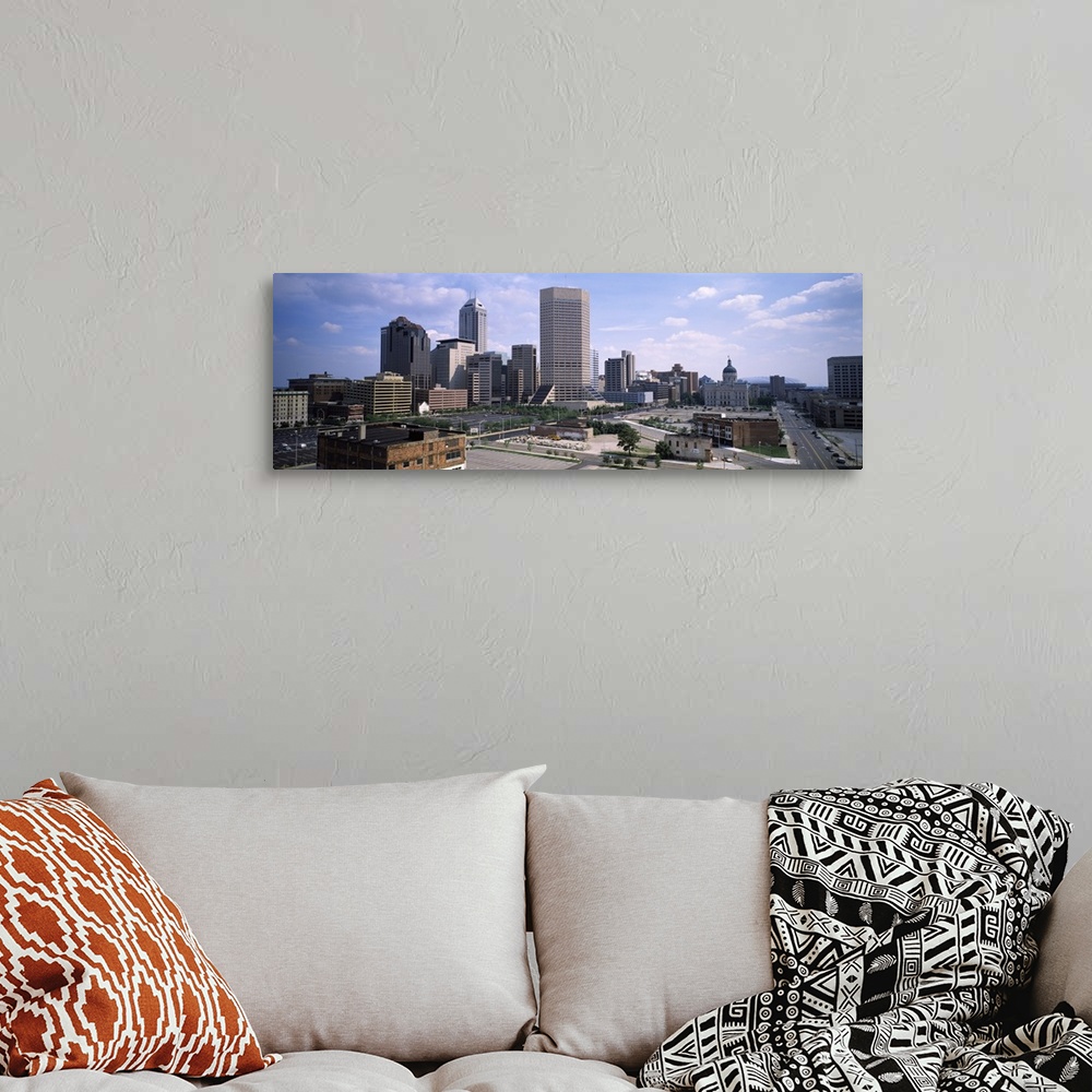 A bohemian room featuring Photograph from above of the city skyline of Indianapolis, Indiana on a sunny day.
