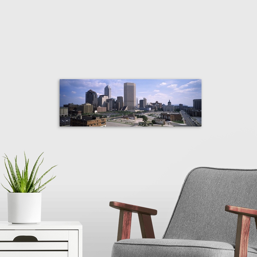 A modern room featuring Photograph from above of the city skyline of Indianapolis, Indiana on a sunny day.