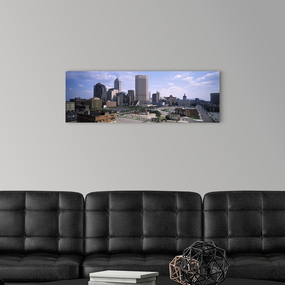 A modern room featuring Photograph from above of the city skyline of Indianapolis, Indiana on a sunny day.