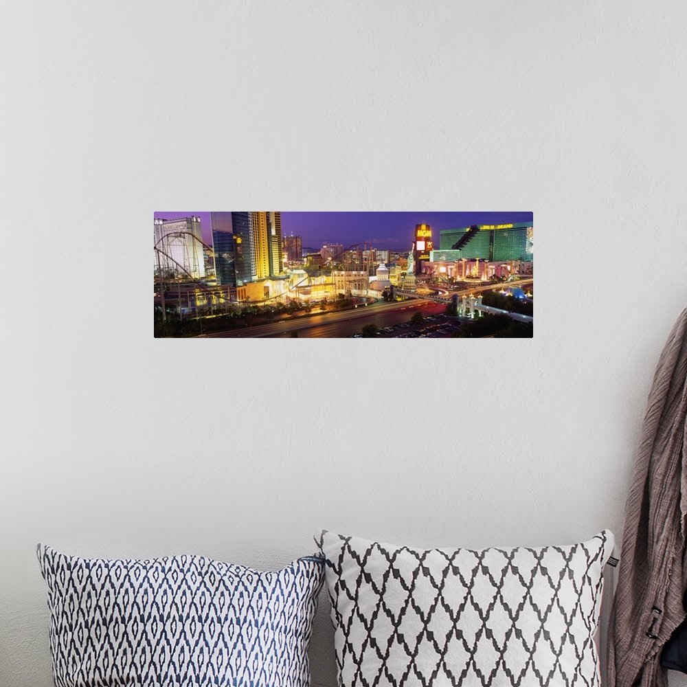 A bohemian room featuring Panoramic photograph on large canvas of the Las Vegas strip, at night, including New York, New Yo...