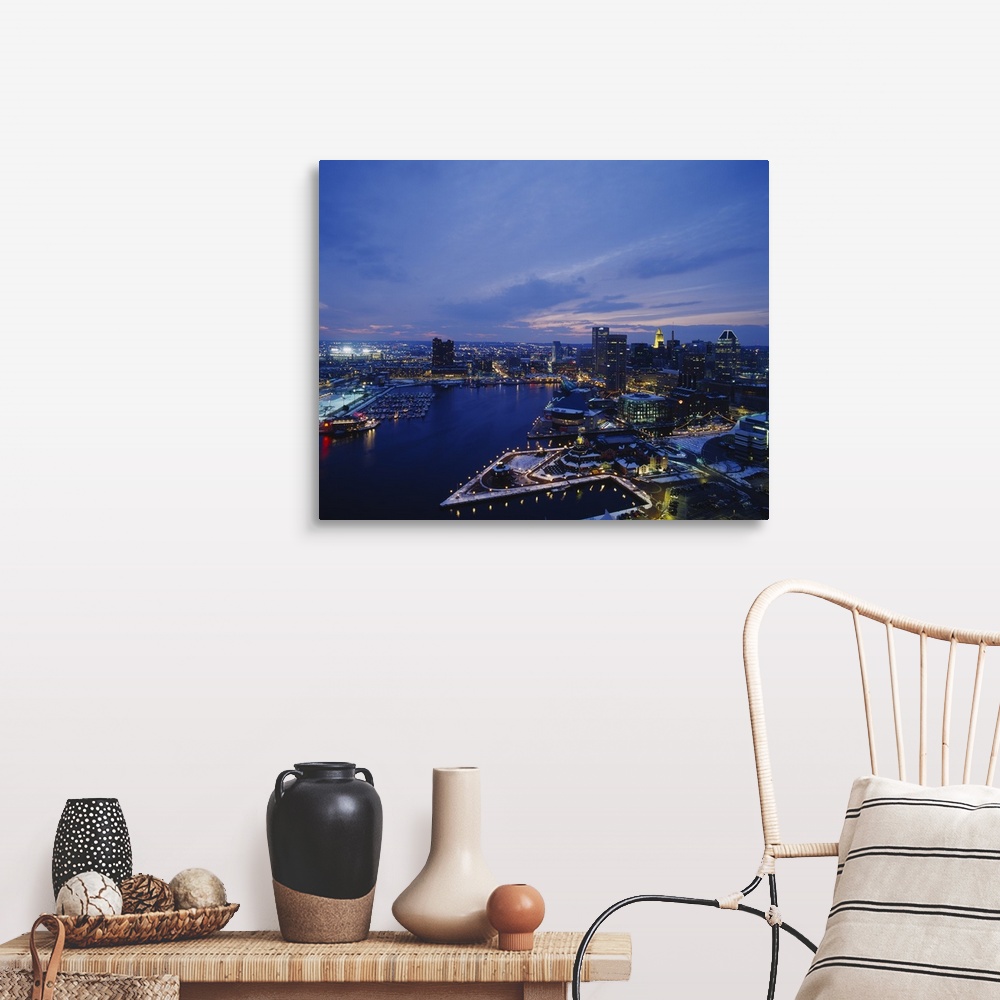 A farmhouse room featuring Large photograph taken from an aerial view over the calm waters of the Inner Harbor within a busy...