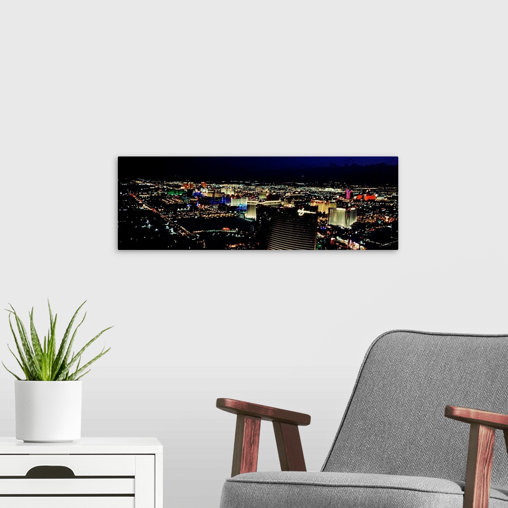 A modern room featuring High angle view of a city lit up at night, The Strip, Las Vegas, Nevada