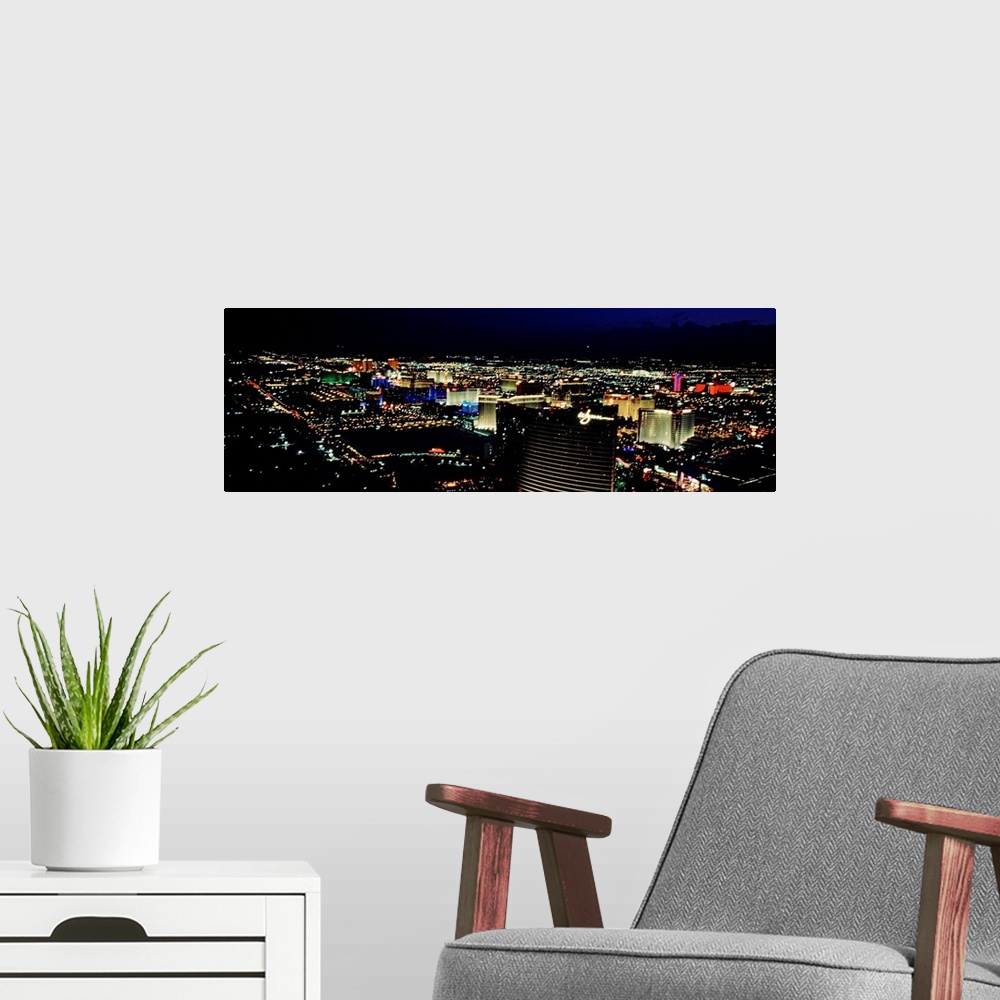 A modern room featuring High angle view of a city lit up at night, The Strip, Las Vegas, Nevada