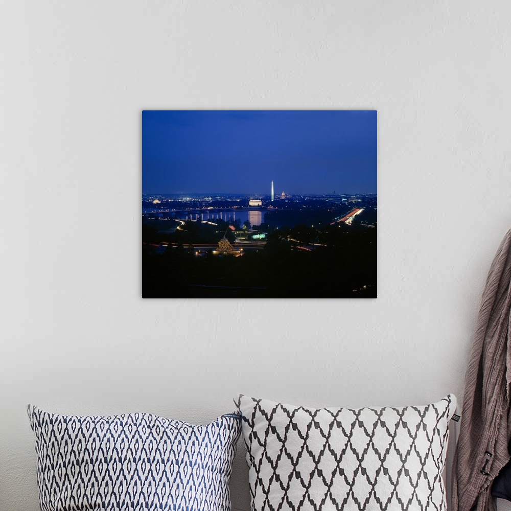 A bohemian room featuring This large piece is a high angle photograph at night of Washington DC with many monuments lit up ...