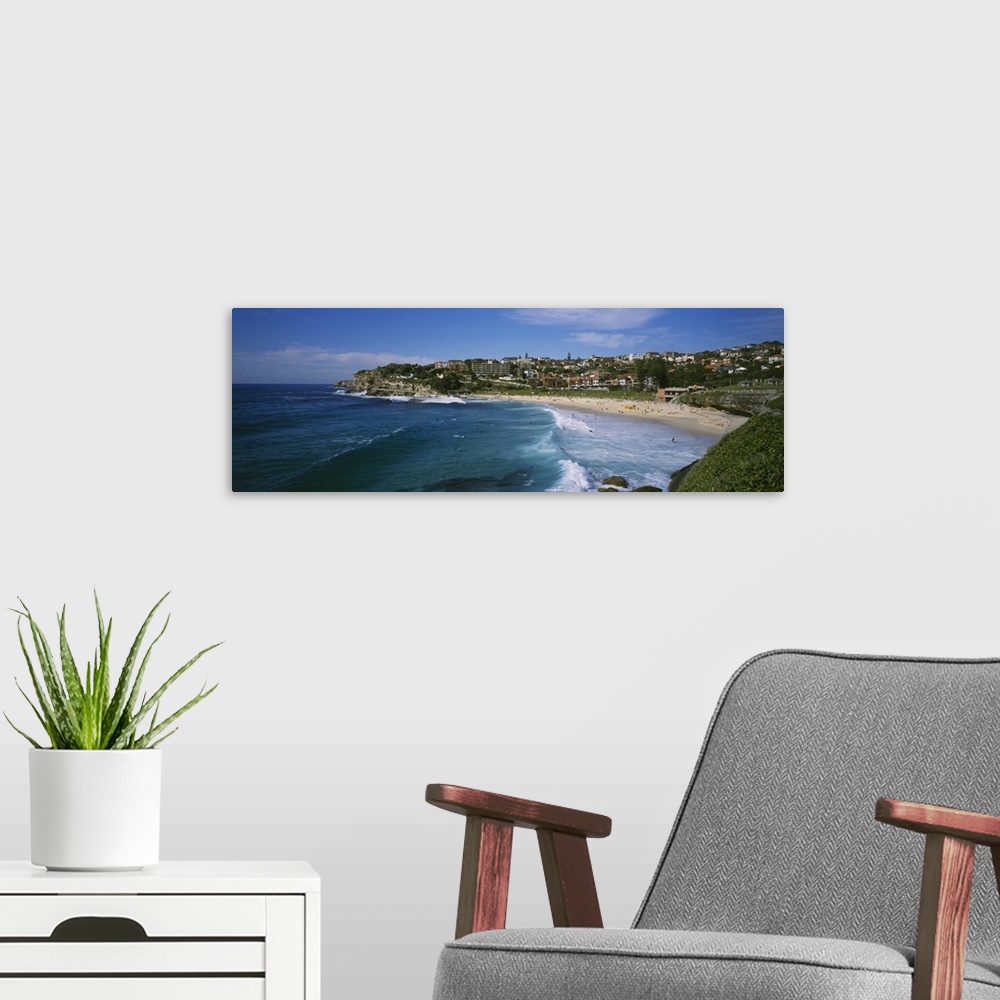 A modern room featuring High angle view of a group of people on the beach, Coogee Beach, Sydney, New South Wales, Australia